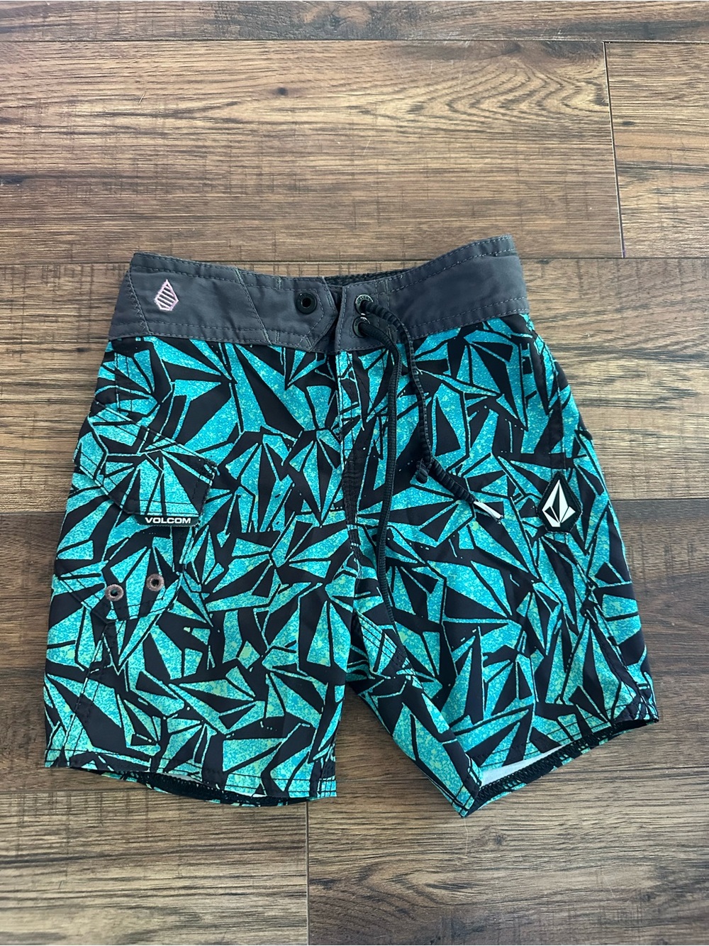 Volcom boy’s Teal and Black Geometric Swim Shorts
